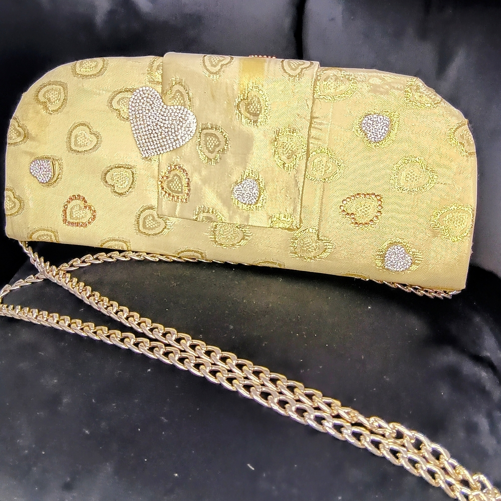 Elegant Gold Heart Clutch With Matching Crown Cap